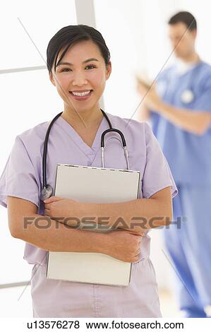 Doctor and nurse in hospital View Large Photo Image Stock Photo - Doctor and nurse in hospital. Fotosearch