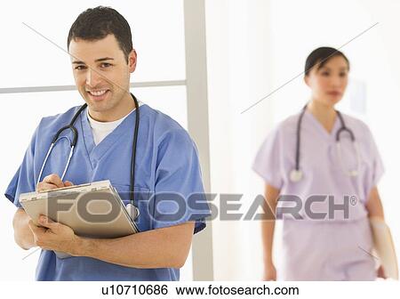 Doctor and nurse in hospital View Large Photo Image Stock Photograph - Doctor and nurse in hospital. Fotosearch