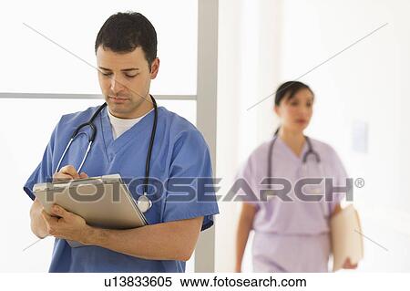 Doctor and nurse in hospital View Large Photo Image Stock Photography - Doctor and nurse in hospital. Fotosearch