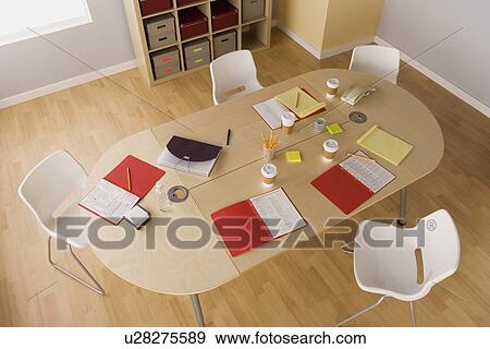 Stock Photo - Elevated view of conference table in board room. Fotosearch