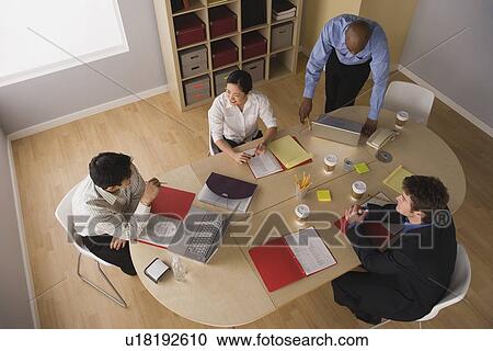 Elevated view of conference table View Large Photo Image Stock Image - Elevated view of conference table. Fotosearch
