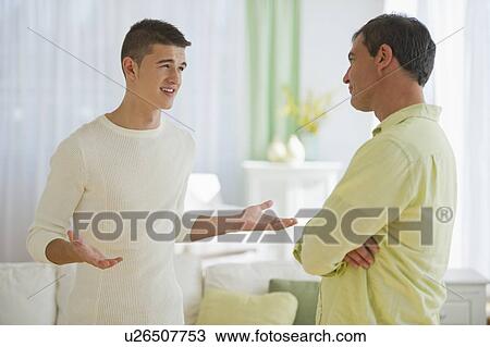 Father and son (16-17) arguing View Large Photo Image Stock Image - Father and son (16-17) arguing. Fotosearch