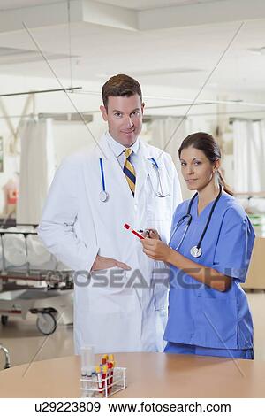 Female and male doctors in hospital View Large Photo Image Stock Photo - Female and male doctors in hospital. Fotosearch