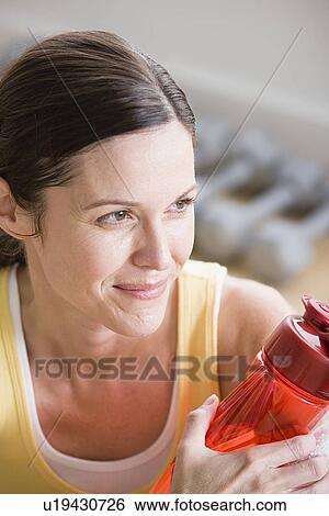 Female athlete resting View Large Photo Image Stock Photograph - Female athlete resting. Fotosearch