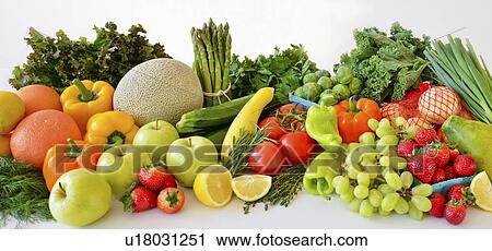 Stock Image - Fresh veggies and fruits, studio shot. Fotosearch