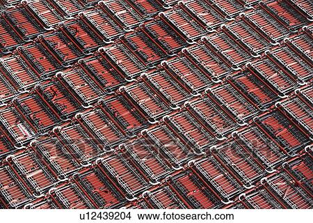 Full frame shot of supermarket trolleys View Large Photo Image Picture - Full frame shot of supermarket trolleys. Fotosearch