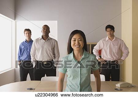 Stock Photograph - Group of businesspeople posing for portrait. Fotosearch