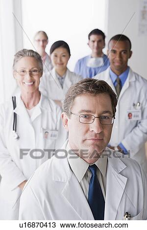 Group portrait of smiling doctors View Large Photo Image Stock Image - Group portrait of smiling doctors. Fotosearch