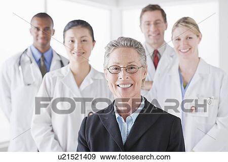 Stock Photo - Group portrait of smiling doctors. Fotosearch