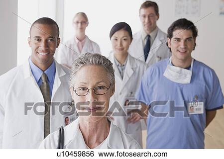 Group portrait of smiling doctors View Large Photo Image Stock Photograph - Group portrait of smiling doctors. Fotosearch