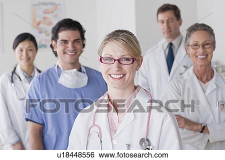Stock Photograph - Group portrait of smiling doctors. Fotosearch
