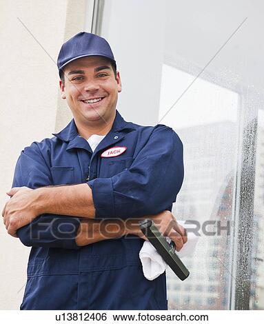 Man cleaning window View Large Photo Image Stock Photograph - Man cleaning window. Fotosearch