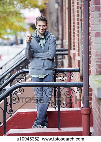Man coming back home View Large Photo Image Stock Image - Man coming back home. Fotosearch