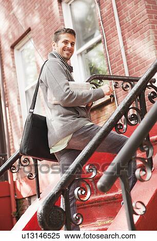 Stock Photography - Man coming back home. Fotosearch
