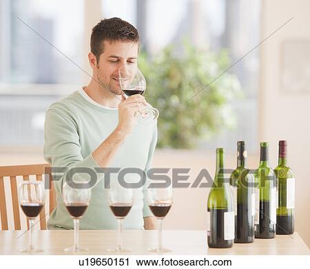Man tasting wine View Large Photo Image Stock Image - Man tasting wine. Fotosearch