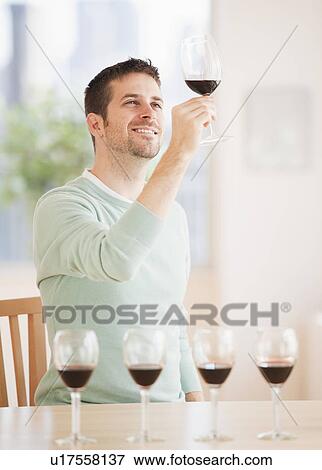 Stock Photo - Man tasting wine. Fotosearch