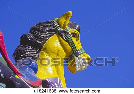 Stock Photo - Mexico, Carousel painted horse used as building decor. Fotosearch