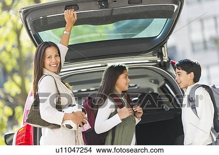 Mother with son (12-13) and daughter (10-11) View Large Photo Image Picture - Mother with son (12-13) and daughter (10-11) . Fotosearch