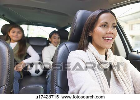 Mother with son (12-13) and daughter (10-11) in car View Large Photo Image Stock Photography - Mother with son (12-13) and daughter (10-11) in car . Fotosearch