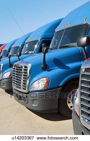 Stock Photo - New semi trucks. Fotosearch