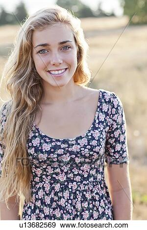 Outdoor portrait of happy teenage girl (16-17) View Large Photo Image Stock Photo - Outdoor portrait of happy teenage girl (16-17) . Fotosearch
