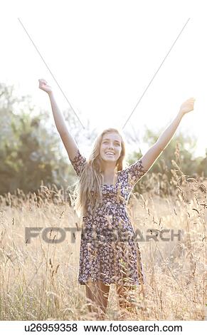 Outdoor portrait of happy teenage girl (16-17) View Large Photo Image Stock Photo - Outdoor portrait of happy teenage girl (16-17) . Fotosearch