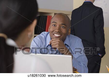 People talking in office View Large Photo Image Stock Image - People talking in office. Fotosearch