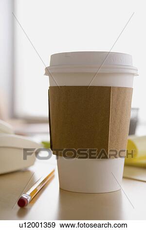 Plastic coffee cup on desk View Large Photo Image Stock Photo - Plastic coffee cup on desk. Fotosearch