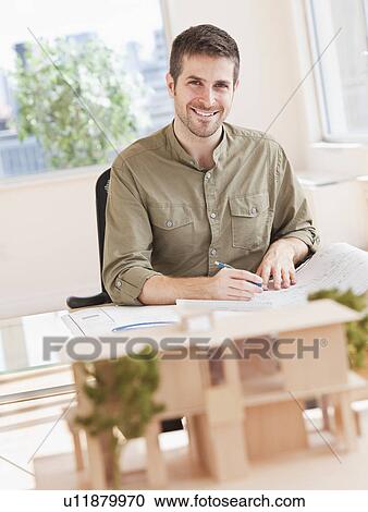 Portrait of architect working in office View Large Photo Image Stock Image - Portrait of architect working in office. Fotosearch