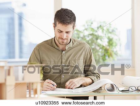 Portrait of architect working in office View Large Photo Image Stock Photography - Portrait of architect working in office. Fotosearch