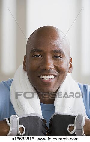 Stock Photograph - Portrait of athlete smiling. Fotosearch