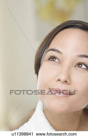 Stock Image - Portrait of attractive woman. Fotosearch
