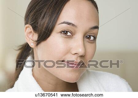 Stock Image - Portrait of attractive woman. Fotosearch