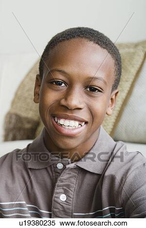 Stock Photography - Portrait of boy (12-13). Fotosearch