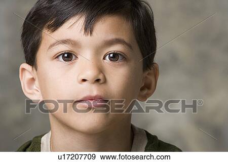 Portrait of boy (8-9), studio shot View Large Photo Image Stock Photo - Portrait of boy (8-9), studio shot. Fotosearch