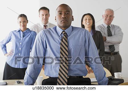 Portrait of business people in office View Large Photo Image Stock Image - Portrait of business people in office. Fotosearch