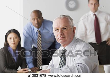 Portrait of business people in office View Large Photo Image Stock Photo - Portrait of business people in office. Fotosearch