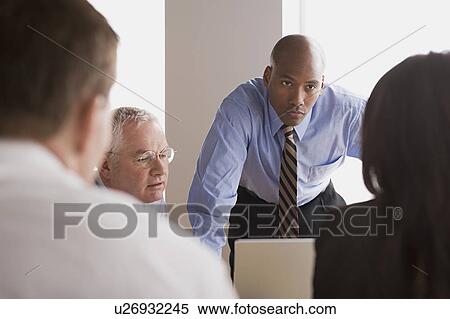Portrait of business people in office View Large Photo Image Stock Photography - Portrait of business people in office. Fotosearch