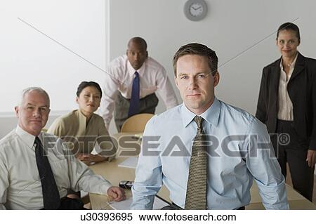 Stock Photography -  Portrait of business people in office. Fotosearch