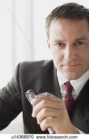 Stock Image - Portrait of businessman. Fotosearch