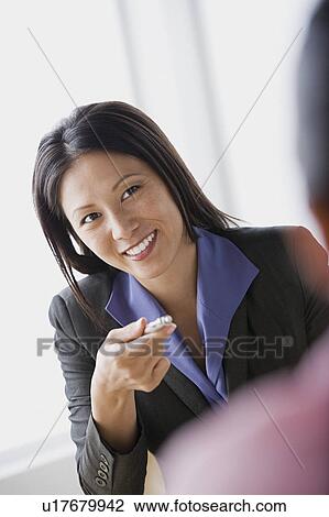 Stock Image - Portrait of businesswoman. Fotosearch