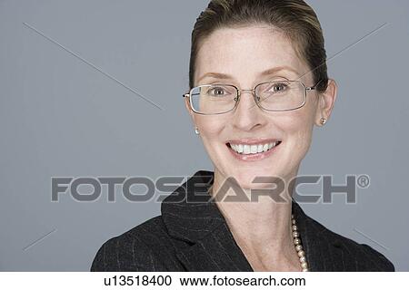 Portrait of cheerful mature businesswoman View Large Photo Image Stock Image - Portrait of cheerful mature businesswoman. Fotosearch