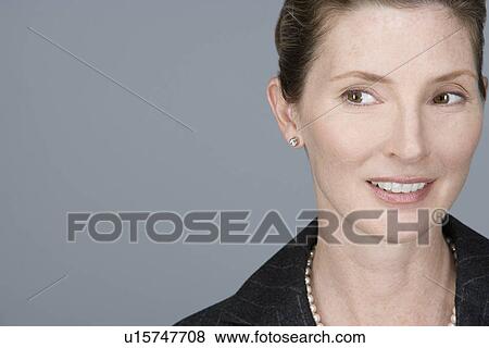 Portrait of cheerful mature businesswoman View Large Photo Image Stock Photo - Portrait of cheerful mature businesswoman. Fotosearch