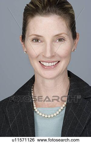 Portrait of cheerful mature businesswoman View Large Photo Image Stock Photograph - Portrait of cheerful mature businesswoman. Fotosearch
