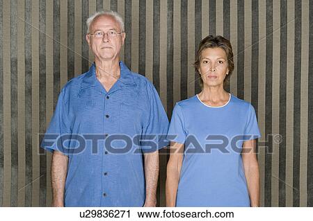 Portrait of couple dressed in blue View Large Photo Image Stock Image - Portrait of couple dressed in blue. Fotosearch