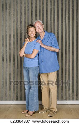 Stock Photo - Portrait of couple dressed in blue. Fotosearch