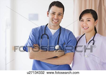 Stock Image - Portrait of doctor and nurse. Fotosearch