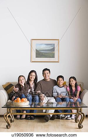 Portrait of family with three children (8-9, 10-11) View Large Photo Image Stock Photograph - Portrait of family with three children (8-9, 10-11). Fotosearch