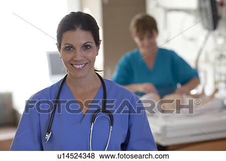 Portrait of female doctor View Large Photo Image Stock Photo - Portrait of female doctor. Fotosearch