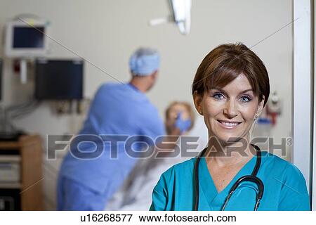 Portrait of female doctor View Large Photo Image Stock Photo - Portrait of female doctor. Fotosearch